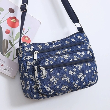 Ženska crossbody torba, gradski minimalistički stil, poliester, Dumpling bag trend, svakodnevna upotreba, zima 2023