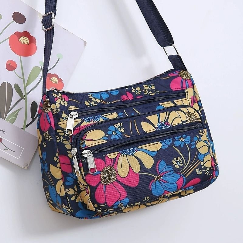 Ženska crossbody torba, gradski minimalistički stil, poliester, Dumpling bag trend, svakodnevna upotreba, zima 2023