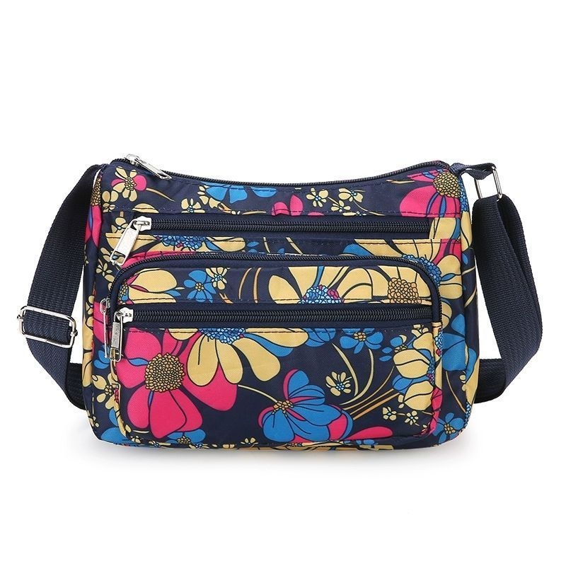 Ženska crossbody torba, gradski minimalistički stil, poliester, Dumpling bag trend, svakodnevna upotreba, zima 2023