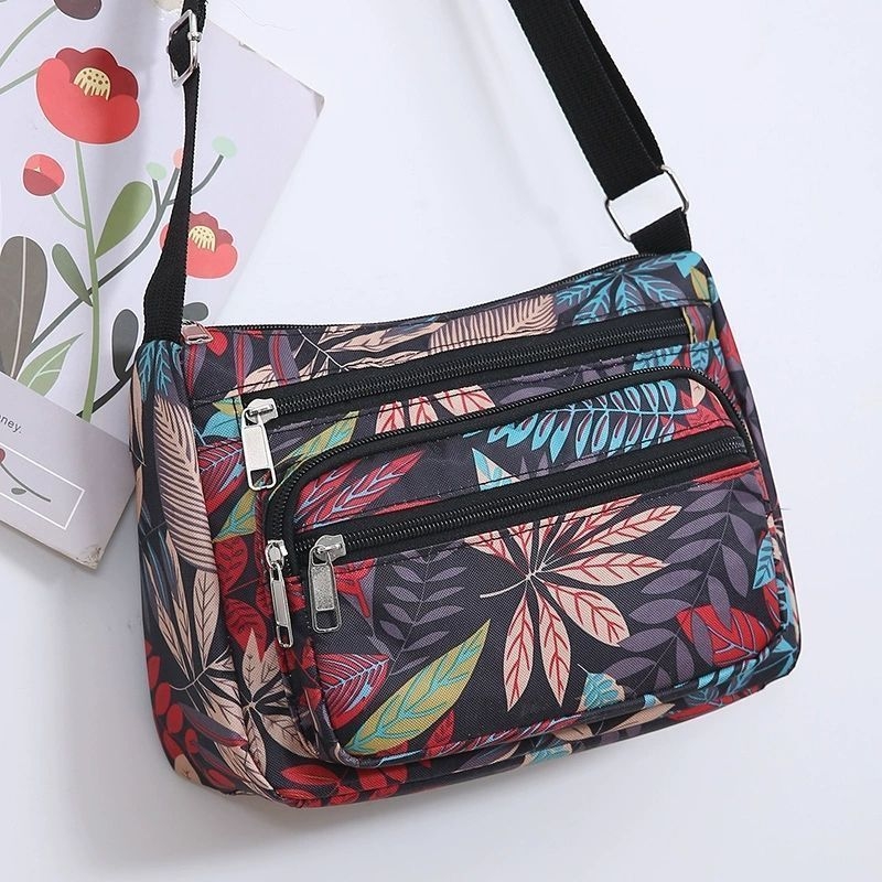 Ženska crossbody torba, gradski minimalistički stil, poliester, Dumpling bag trend, svakodnevna upotreba, zima 2023