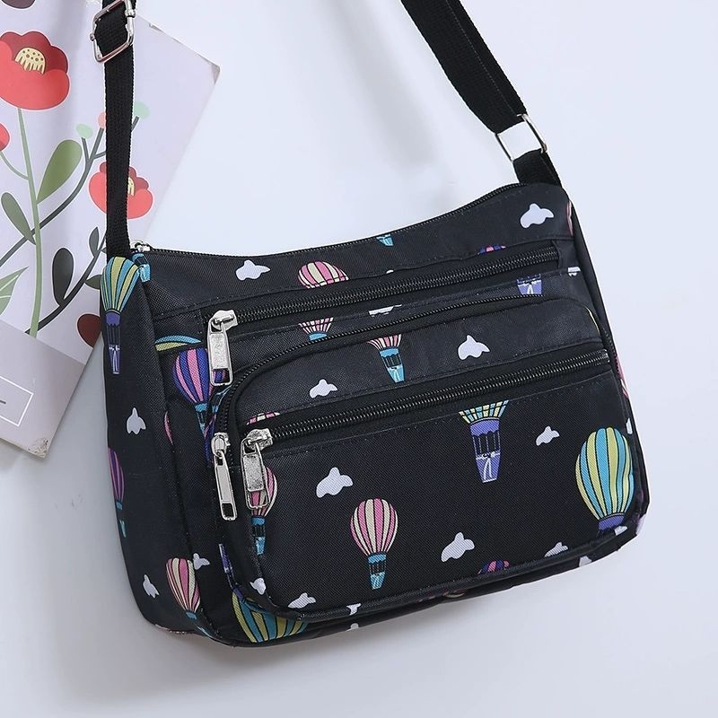 Ženska crossbody torba, gradski minimalistički stil, poliester, Dumpling bag trend, svakodnevna upotreba, zima 2023