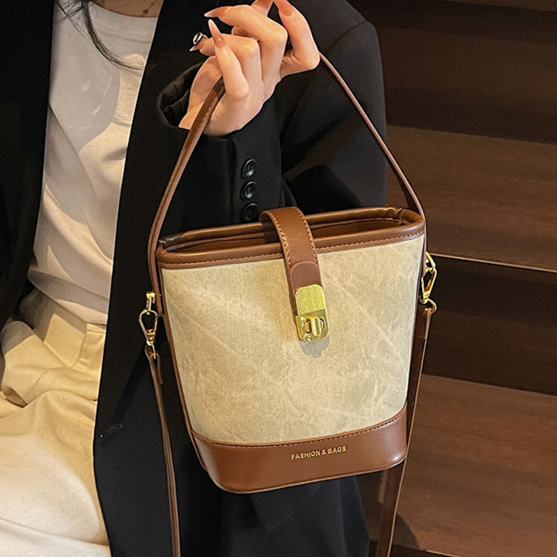 Ženska mala bucket torba, ljeto 2025, svestrana retro casual PU koža, torba na rame ili crossbody