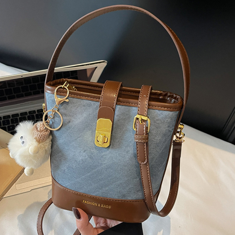 Ženska mala bucket torba, ljeto 2025, svestrana retro casual PU koža, torba na rame ili crossbody
