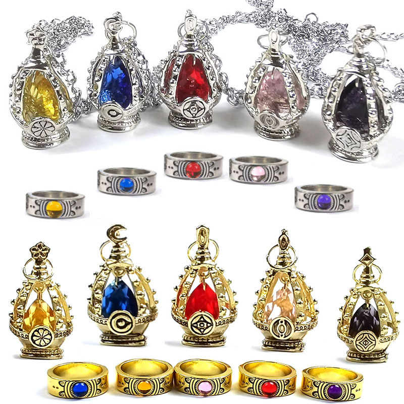 Ötvözetből készült ékszerszett elektroplatírozással, csavart lánccal, nyaklánccal és kézre illő ékszerekkel, függők szív, könnycsepp és harang formában