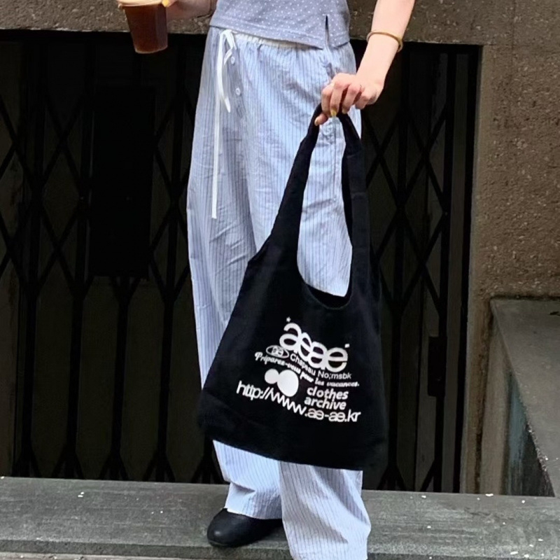 Kanvas bucket torba, unisex stil, mekana konstrukcija, pamukova podstava, unutarnja džep, otvoreni vanjski džep, za slobodno vrijeme, jesen 2025