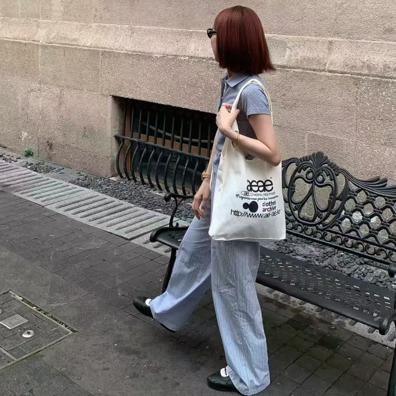Kanvas bucket torba, unisex stil, mekana konstrukcija, pamukova podstava, unutarnja džep, otvoreni vanjski džep, za slobodno vrijeme, jesen 2025