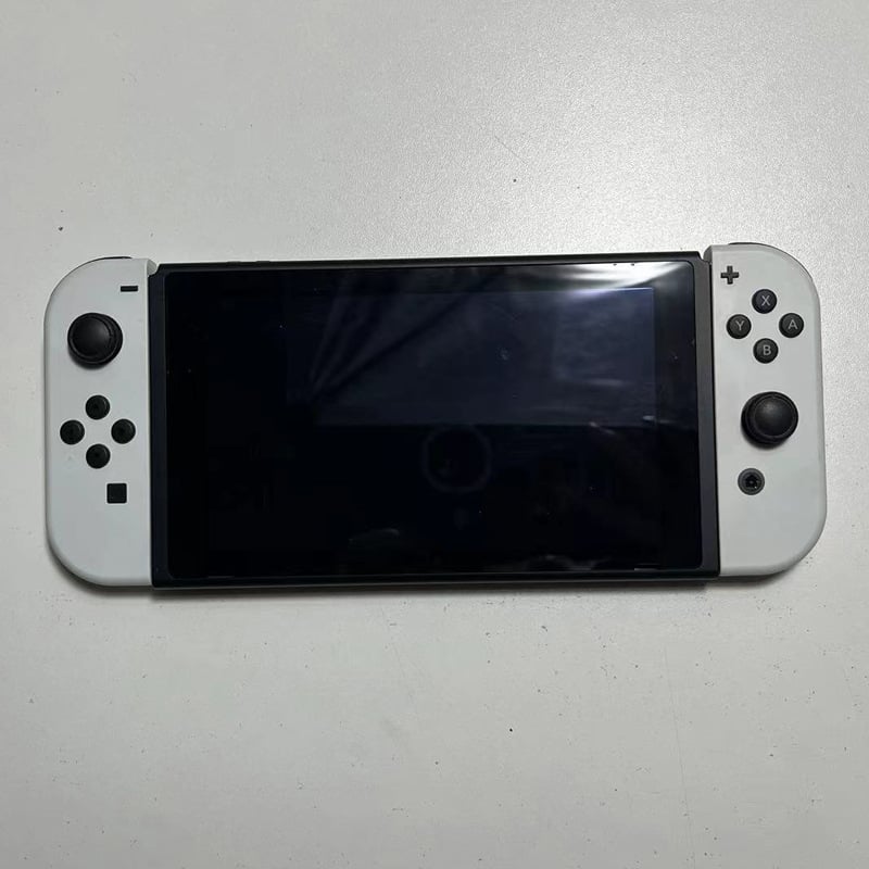 Nintendo Switch display model NS su valdikliu – vitrinos rekvizitas (Modelis:NS; Dėžė: priimančioji vienetė, 1 rankinis valdiklis, 1 pora; Svoris: 400 g; Žaidimo versija: paperback)