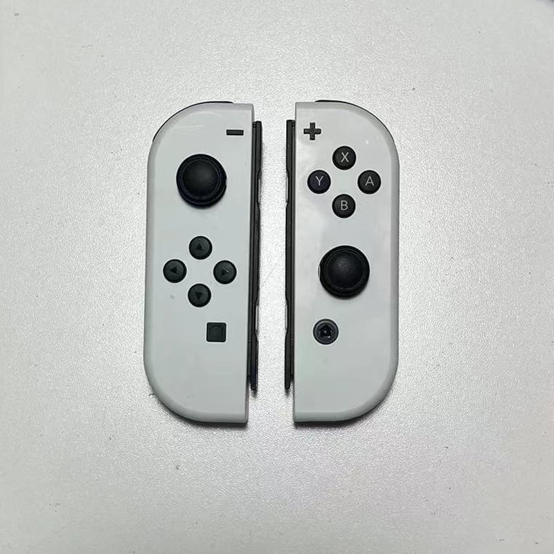 Nintendo Switch display model NS su valdikliu – vitrinos rekvizitas (Modelis:NS; Dėžė: priimančioji vienetė, 1 rankinis valdiklis, 1 pora; Svoris: 400 g; Žaidimo versija: paperback)