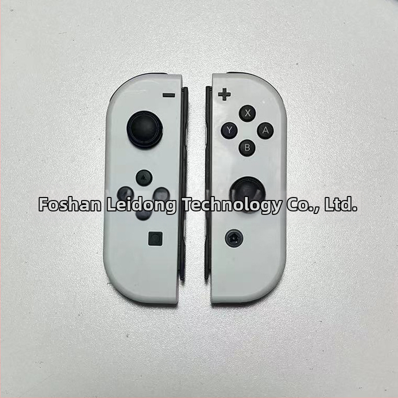 Nintendo Switch display model NS su valdikliu – vitrinos rekvizitas (Modelis:NS; Dėžė: priimančioji vienetė, 1 rankinis valdiklis, 1 pora; Svoris: 400 g; Žaidimo versija: paperback)