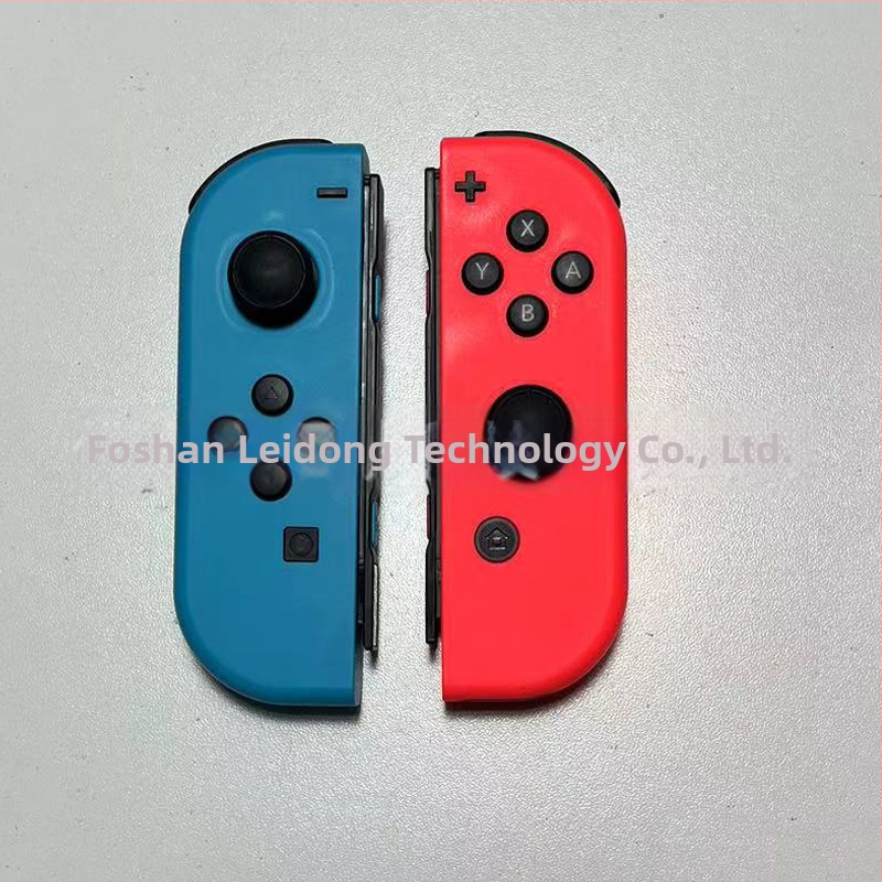 Nintendo Switch display model NS su valdikliu – vitrinos rekvizitas (Modelis:NS; Dėžė: priimančioji vienetė, 1 rankinis valdiklis, 1 pora; Svoris: 400 g; Žaidimo versija: paperback)