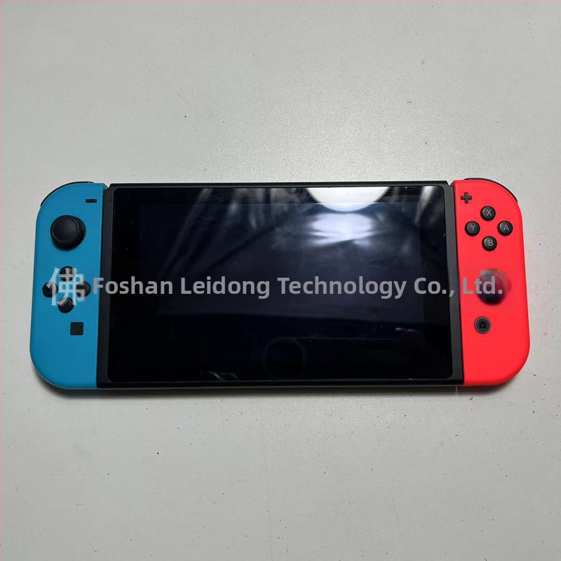 Nintendo Switch display model NS su valdikliu – vitrinos rekvizitas (Modelis:NS; Dėžė: priimančioji vienetė, 1 rankinis valdiklis, 1 pora; Svoris: 400 g; Žaidimo versija: paperback)