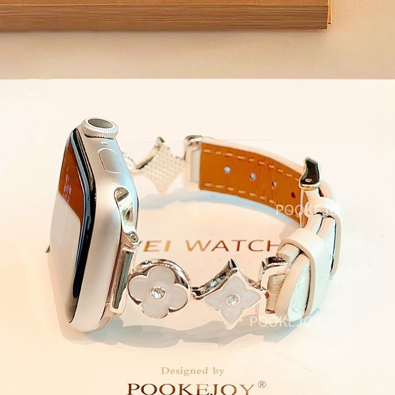 Remienok na Apple Watch – kovový pás s koženým prvkom a motívom štyroch listov; kompatibilný s Apple Watch; rozhranie veľkosti na mieru; zapínanie podľa detailov; podnikateľský štýl