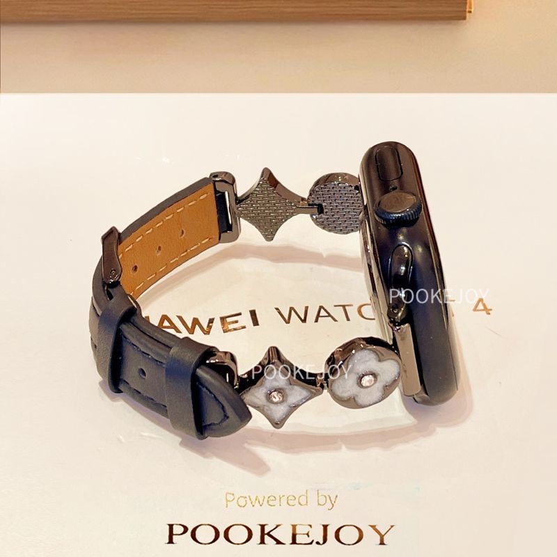 Remienok na Apple Watch – kovový pás s koženým prvkom a motívom štyroch listov; kompatibilný s Apple Watch; rozhranie veľkosti na mieru; zapínanie podľa detailov; podnikateľský štýl