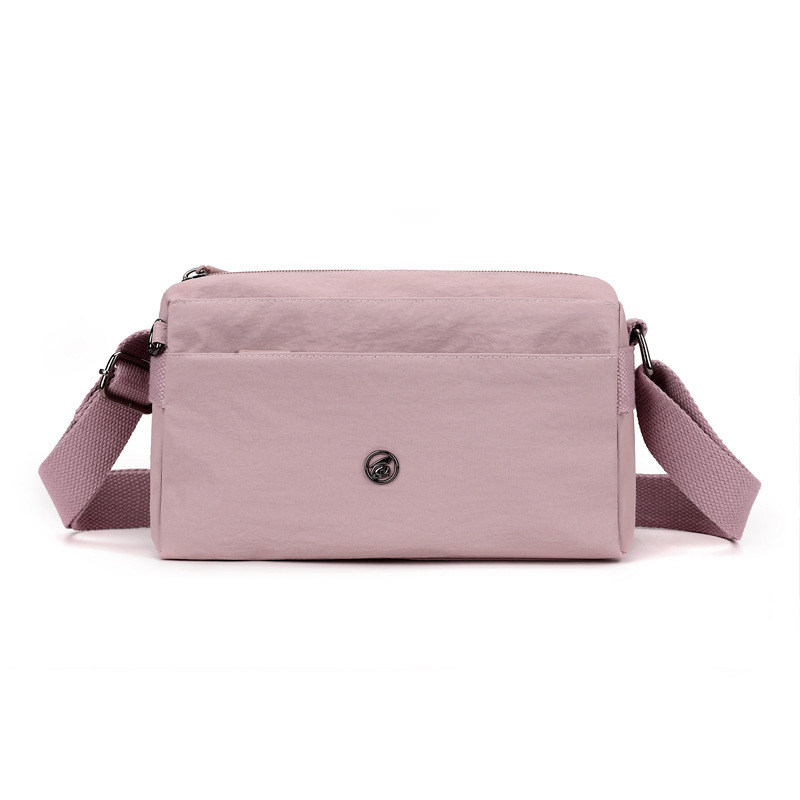 Crossbody torba - urbani minimalistički stil, Oxford plat, horizontalni kvadratni oblik, zatvaranje na zip