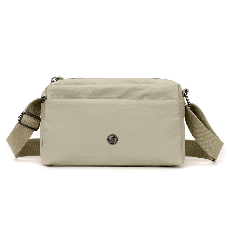 Crossbody torba - urbani minimalistički stil, Oxford plat, horizontalni kvadratni oblik, zatvaranje na zip