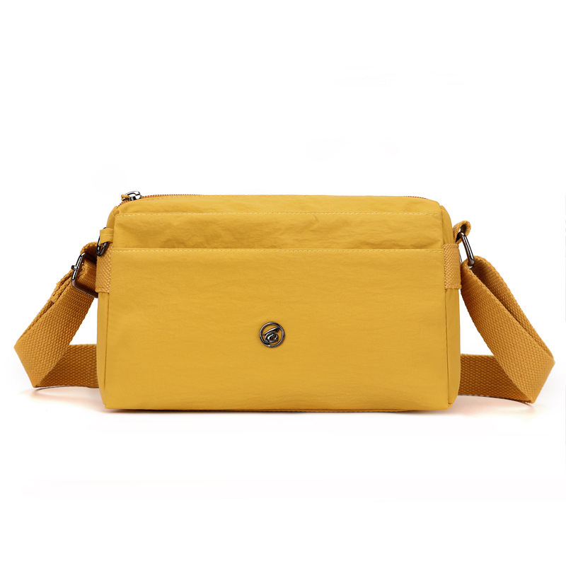 Crossbody torba - urbani minimalistički stil, Oxford plat, horizontalni kvadratni oblik, zatvaranje na zip