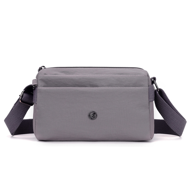 Crossbody torba - urbani minimalistički stil, Oxford plat, horizontalni kvadratni oblik, zatvaranje na zip