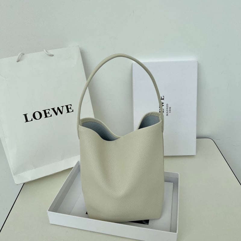Ženska tote torba od prave kože, bucket stil, gradska moda, podstava od tkanine, unutarnji džep