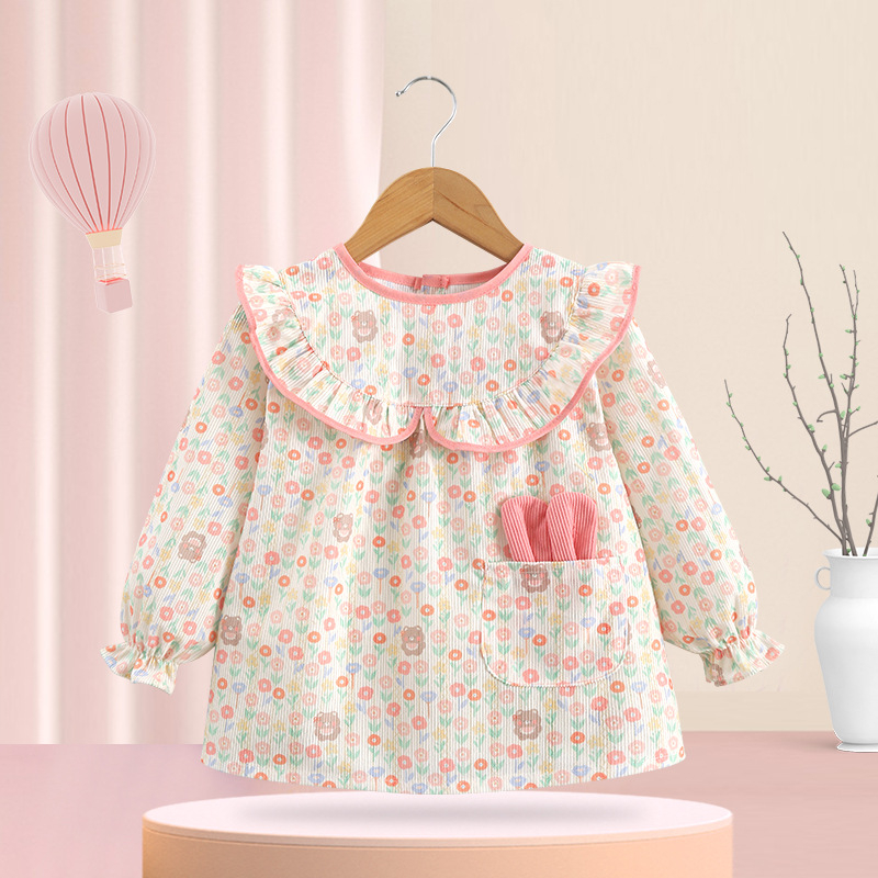 Bērnu smoks – ūdensizturīgs corduroy audums, reverses dizains, meitenēm 1–3 gadi (garums 80–100 cm), rudens 2025 izlaidums