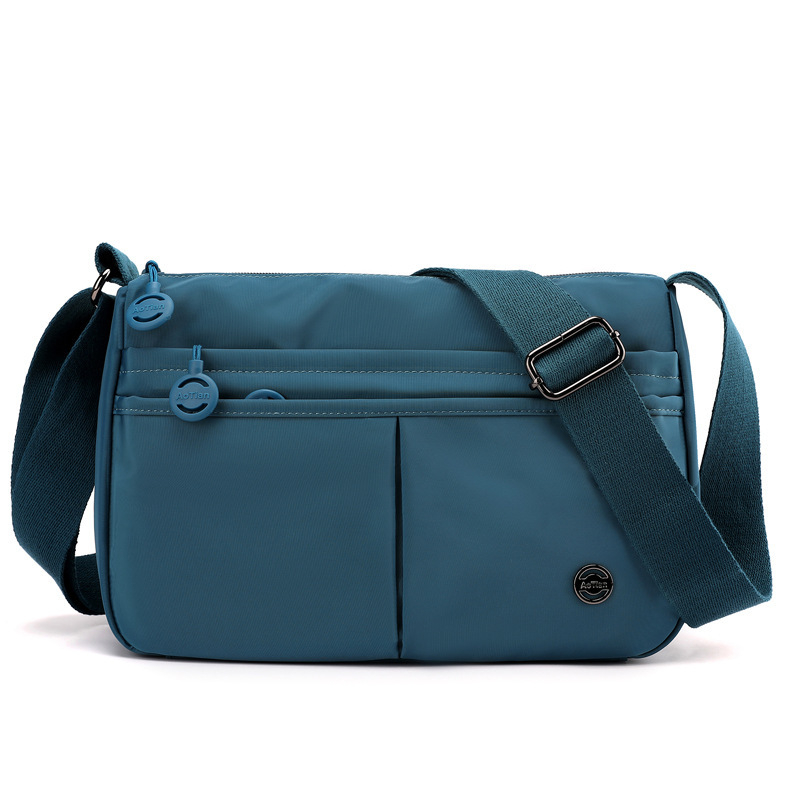 Aotian crossbody torbica od Oxford platna, vodoravni kvadratni oblik – zatvaranje na zip, laminirani pretinac, trodimenzionalan vanjski dizajn