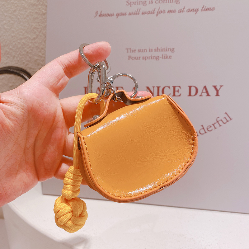 Novčanik od miješanih materijala — Haning Peach, jesen 2025, unisex, za pohranu manjih stvari