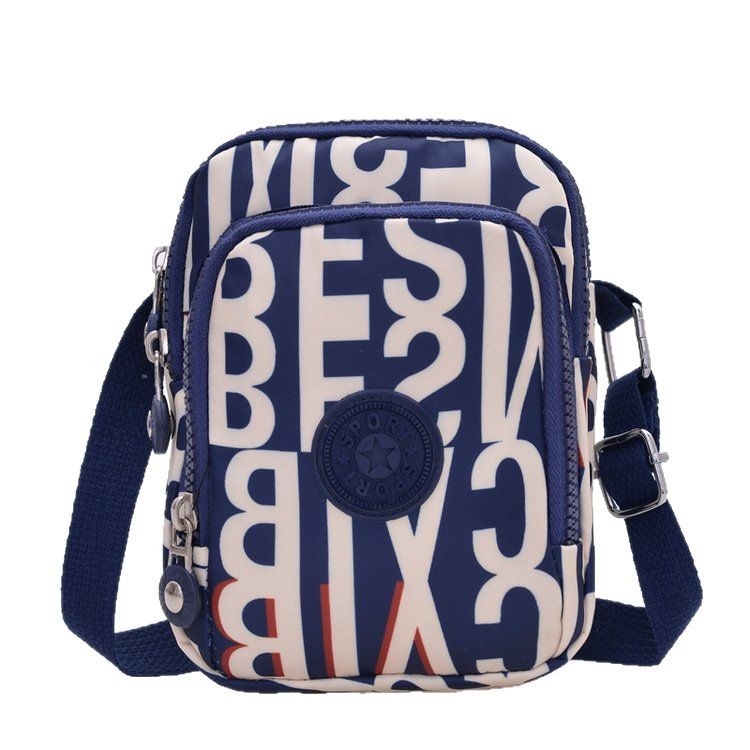 Vertikalna crossbody torbica od Oxford platna, poliester podstava, ovalni oblik, zatvaranje na zip, unutarnji džep sa zipom