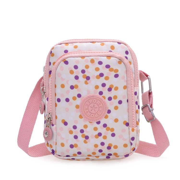 Vertikalna crossbody torbica od Oxford platna, poliester podstava, ovalni oblik, zatvaranje na zip, unutarnji džep sa zipom