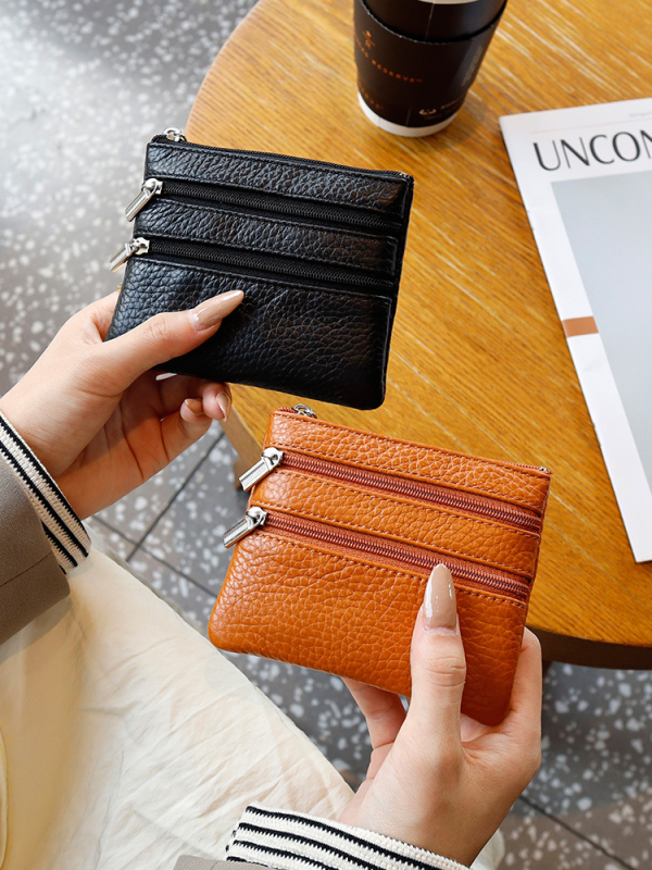 Uniszex valódi bőrből készült érmés táska, első réteg szarvasmarha bőrből, egyszínű külső, poliészter bélés, kulcs- és kártyatartó multifunkciós rekesz, kopásálló