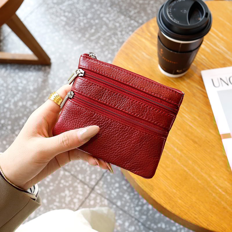 Uniszex valódi bőrből készült érmés táska, első réteg szarvasmarha bőrből, egyszínű külső, poliészter bélés, kulcs- és kártyatartó multifunkciós rekesz, kopásálló