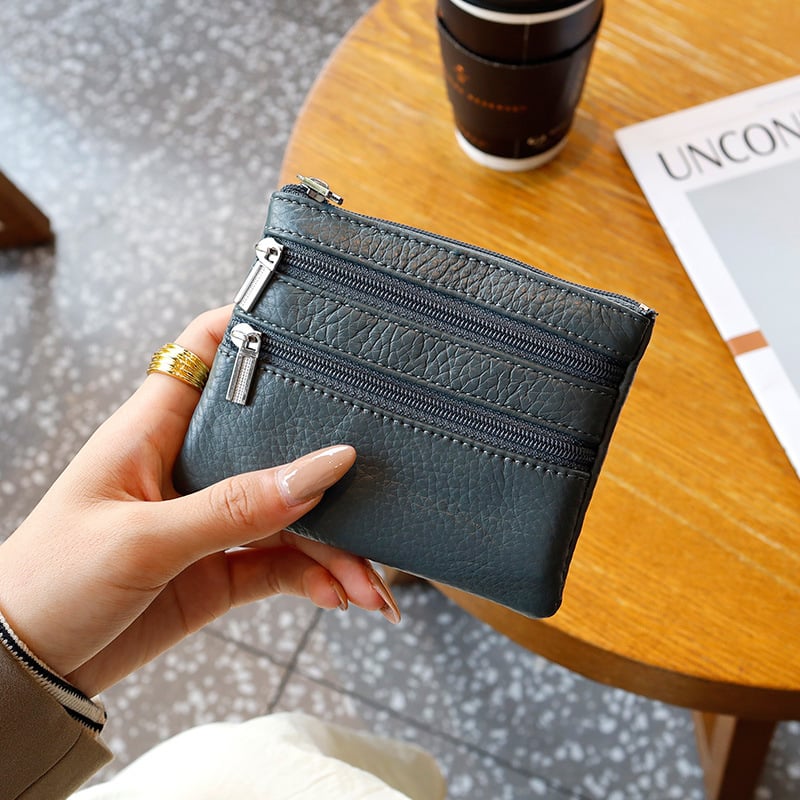 Uniszex valódi bőrből készült érmés táska, első réteg szarvasmarha bőrből, egyszínű külső, poliészter bélés, kulcs- és kártyatartó multifunkciós rekesz, kopásálló