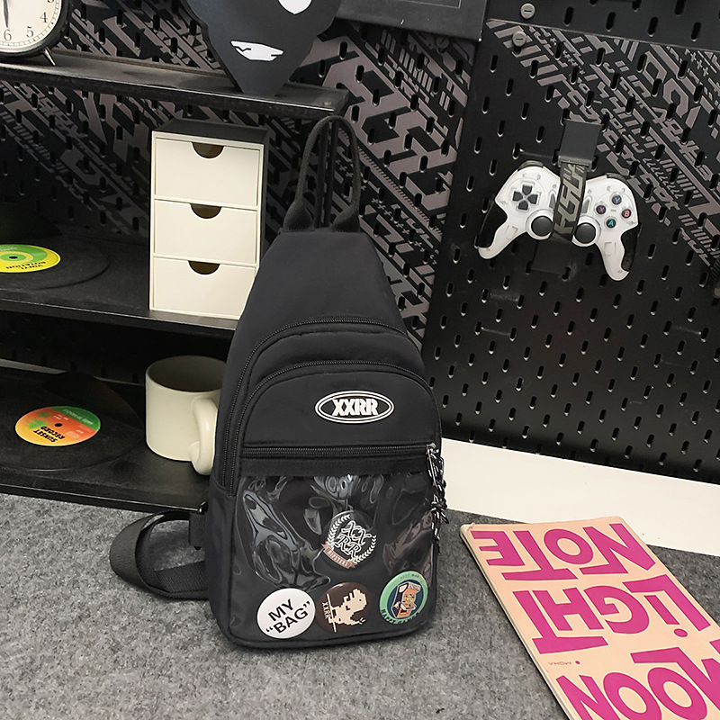 Nylon keresztpántos táska cipzárral, puha belsővel, poliészter béléssel, telefonzseb