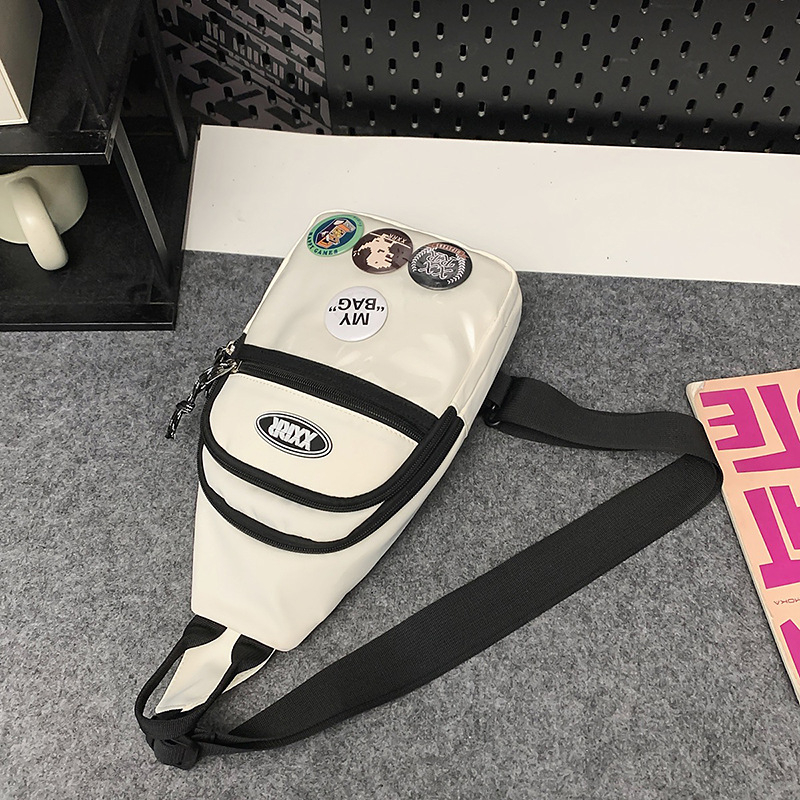 Nylon keresztpántos táska cipzárral, puha belsővel, poliészter béléssel, telefonzseb