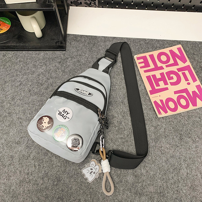 Nylon keresztpántos táska cipzárral, puha belsővel, poliészter béléssel, telefonzseb