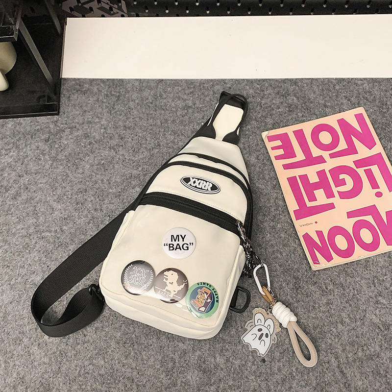 Nylon keresztpántos táska cipzárral, puha belsővel, poliészter béléssel, telefonzseb