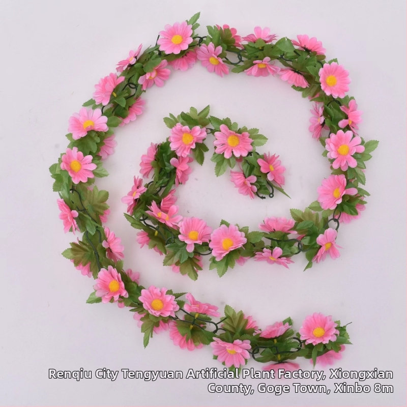 Művirágos kúszónövény margarétával és kis napraforgókkal; anyagok: műanyag és selyemvirágok; készítés: stilizálás, injektív öntés; fajtája: Daisy