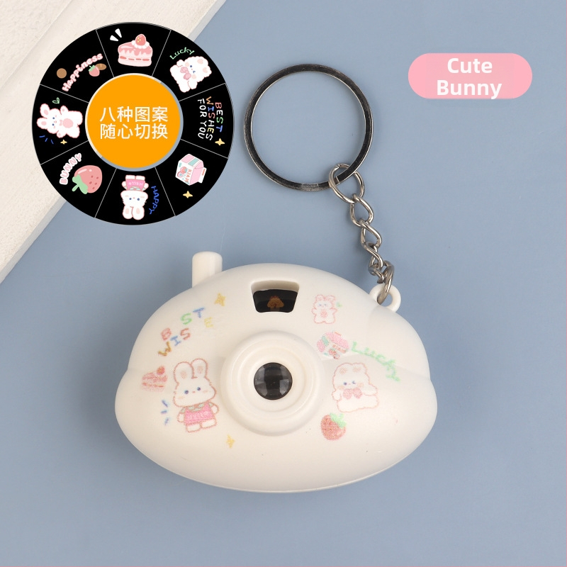 Mini fotoaparát so svetelnou projekciou v kartúnovom štýle, prívesok na kľúče, plast, pre deti 4–6 rokov