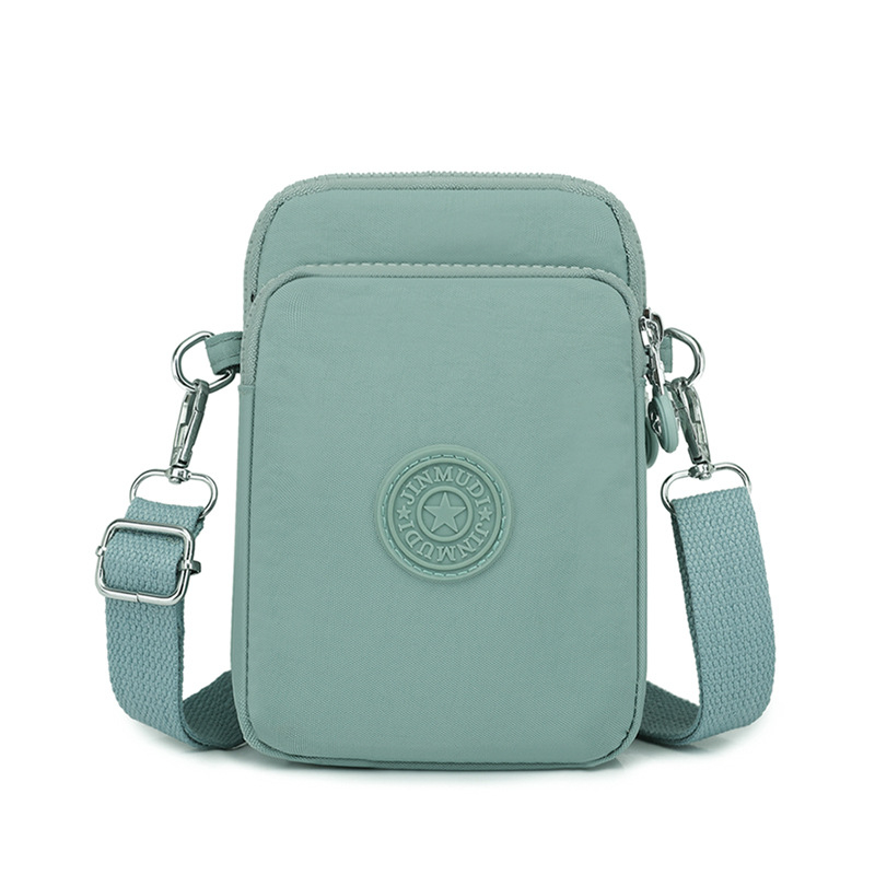 Ženska nylon torbica za telefon, crossbody stil, vertikalni kvadratni oblik, zatvarač, unutarnji džep s zatvaračem