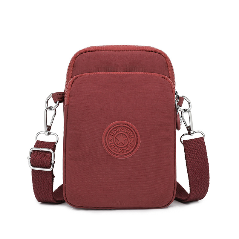 Ženska nylon torbica za telefon, crossbody stil, vertikalni kvadratni oblik, zatvarač, unutarnji džep s zatvaračem