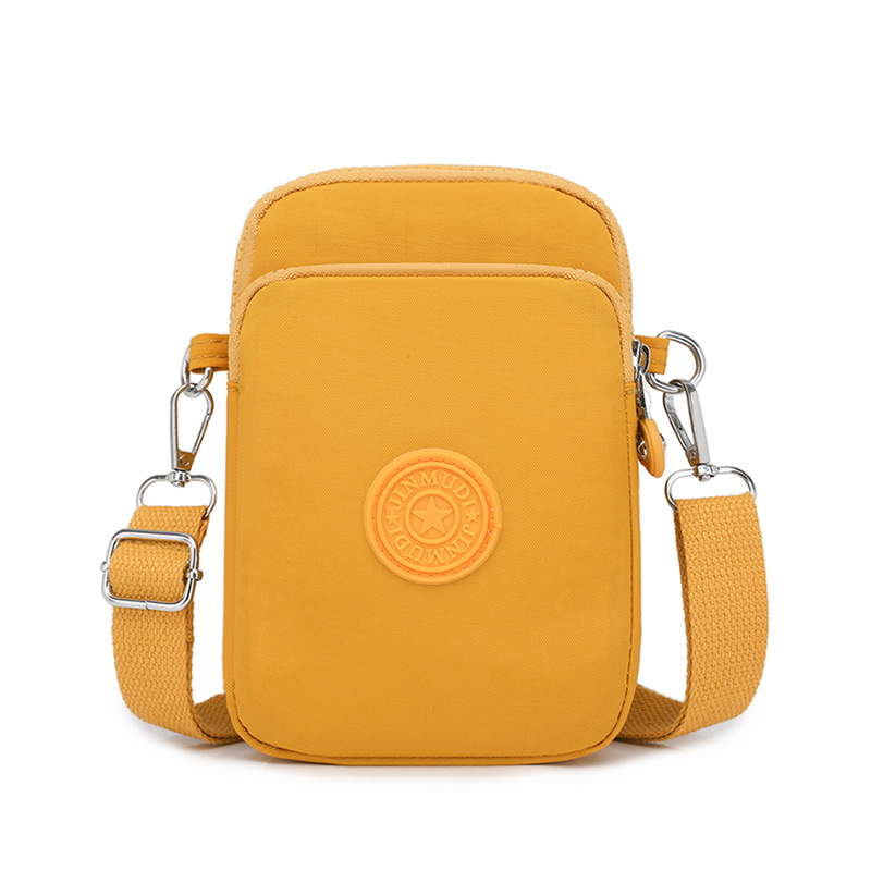 Ženska nylon torbica za telefon, crossbody stil, vertikalni kvadratni oblik, zatvarač, unutarnji džep s zatvaračem