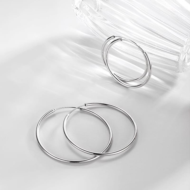 F136 Titanijeva legura – jednostavne kružne naušnice za žene – suptilan luksuz, elegantan stil, G23 titan oversized piercing naušnice