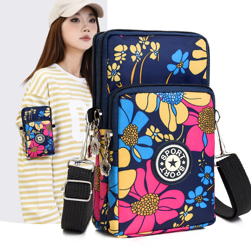 Nylon válltáska cipzárral, függőleges négyzet alakú forma, mobiltelefon zseb, poliészter bélés — városi minimalist stílus mindennapi használatra