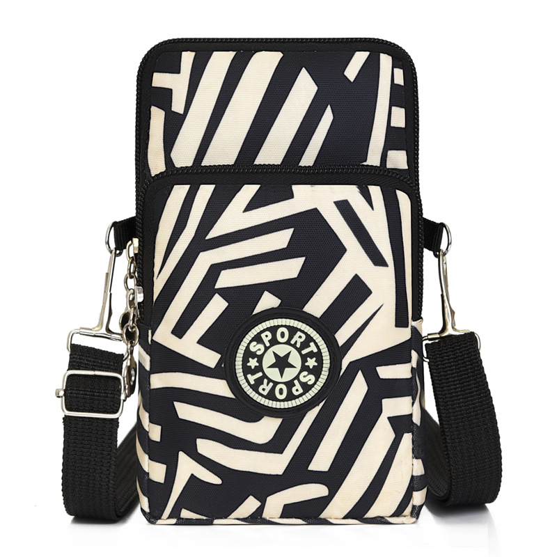 Nylon válltáska cipzárral, függőleges négyzet alakú forma, mobiltelefon zseb, poliészter bélés — városi minimalist stílus mindennapi használatra