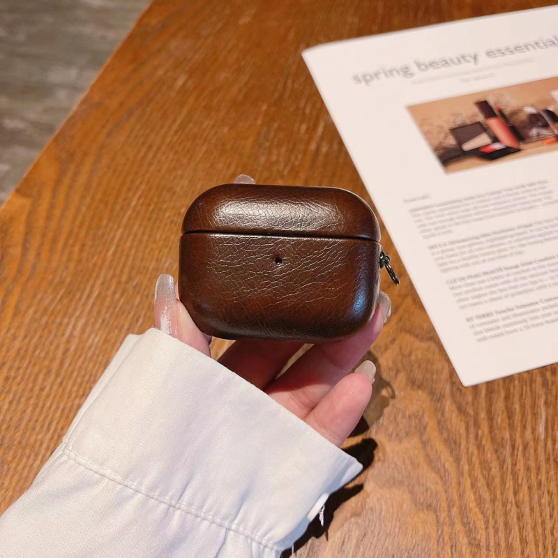 Apple AirPods védő kemény tok – műbőr, velúr, PC; matt felület; kézzel készített; kompatibilis AirPods 1/2/3/4 és Pro 2