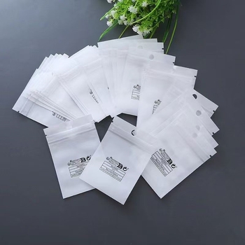 Опаковъчна чанта от перлен CPP филм, самозалепваща, мотив Ин Ян, за бижута, кабели за данни и мобилни аксесоари (Материал: CPP филм с перлен ефект; Затваряне: самозалепващо; Мотив: Ин Ян; Приложение: бижута, кабели за данни, мобилни аксесоари)