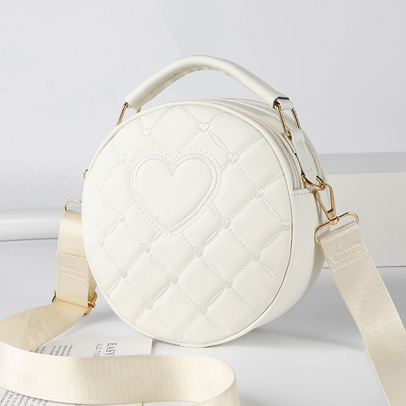 Ženska crossbody torba, PU materijal, okrugli oblik, zatvarač, džep za mobitel
