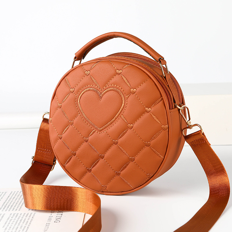 Ženska crossbody torba, PU materijal, okrugli oblik, zatvarač, džep za mobitel