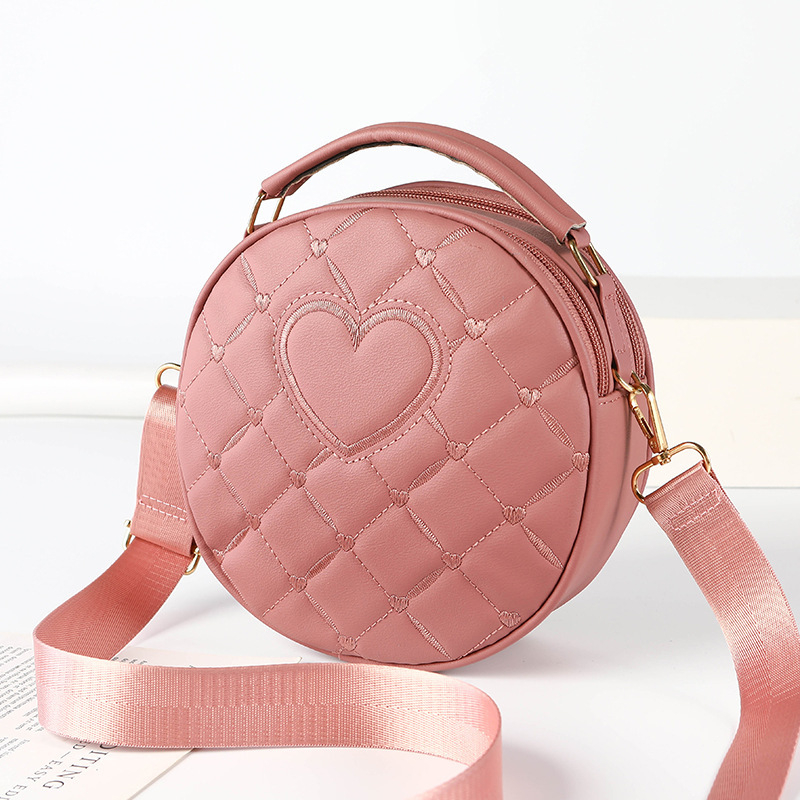 Ženska crossbody torba, PU materijal, okrugli oblik, zatvarač, džep za mobitel