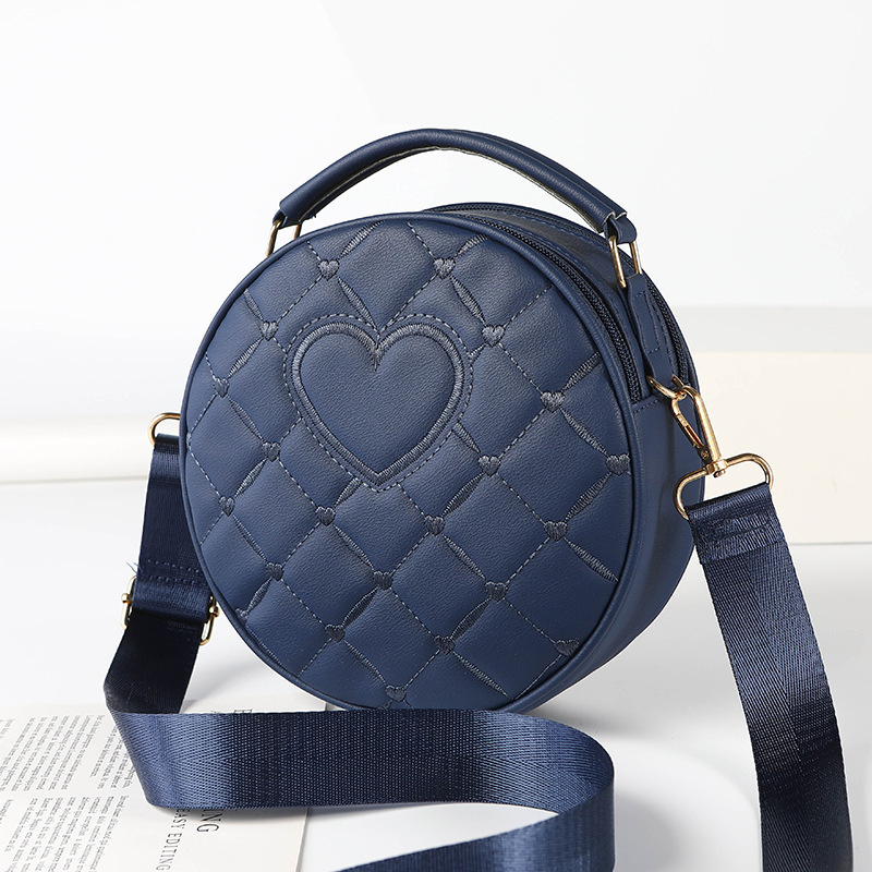 Ženska crossbody torba, PU materijal, okrugli oblik, zatvarač, džep za mobitel