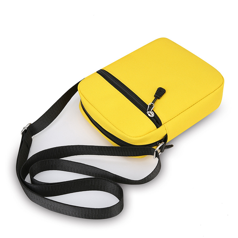 Ženska crossbody torba - Oxford tkanina, vertikalni kvadratni oblik, zatvaranje zipom, podstava od poliestera, unutarnja pretinica za telefon