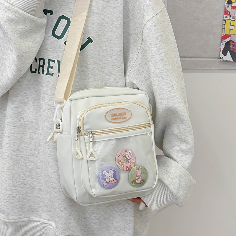 Nylon torbica za rame, crossbody stil – vertikalni kvadratni oblik, zatvarač, unutarnji džepovi za telefon, identifikacijsku karticu i kameru